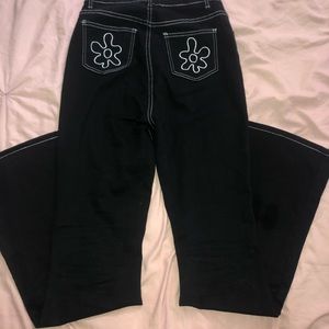 flare pants with flower back pocket print